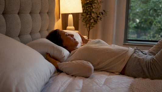 Person lying on mattress adjusting to new back support