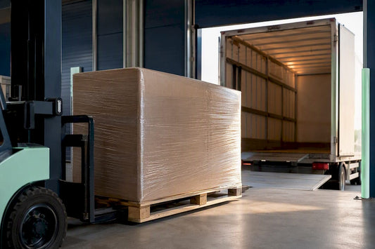 Boxed mattress shipment at loading dock